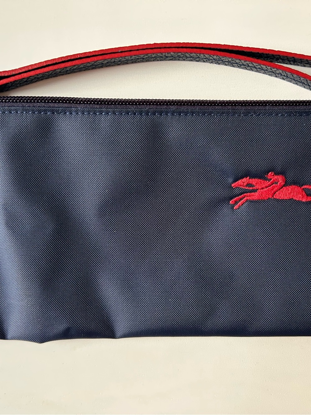 Longchamp Navy Nylon Wristlet with Red Logo
